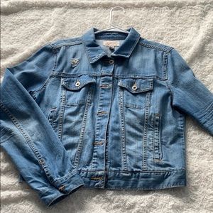 Custom Jean jacket with daisy back panel